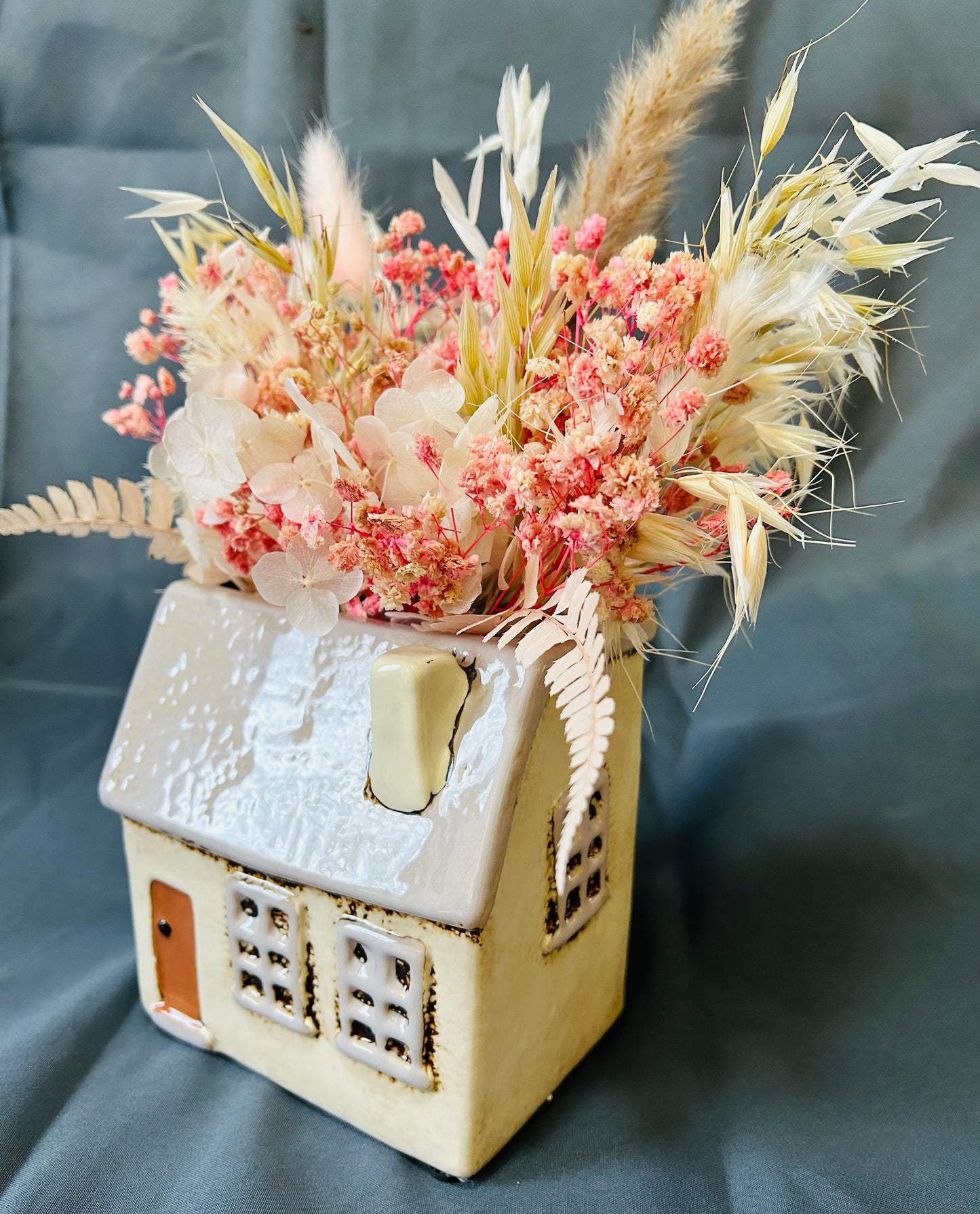 Plant pot with dried flowers